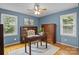 Stylish office with hardwood floors, ample natural light, and classic wooden furniture at 144 Sea Trail Dr, Mooresville, NC 28117
