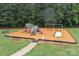 Playground with slides, swings, benches, and a picnic table at 144 Sea Trail Dr, Mooresville, NC 28117