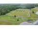 Aerial shot featuring soccer fields, facilities and tree line; provides a great space for sports activities at 144 Sea Trail Dr, Mooresville, NC 28117