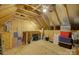 Unfinished attic space with exposed beams and storage potential for customizable use at 14503 Crest Ct, Charlotte, NC 28278