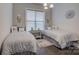 Bright bedroom featuring matching twin beds, and modern lighting at 14503 Crest Ct, Charlotte, NC 28278