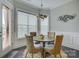 Bright breakfast nook featuring modern light fixture, decor, and lots of light at 14503 Crest Ct, Charlotte, NC 28278