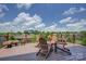Relaxing deck featuring stylish outdoor furniture and neighborhood views at 14503 Crest Ct, Charlotte, NC 28278