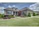 Charming brick home featuring a well-manicured lawn and beautiful landscaping at 14503 Crest Ct, Charlotte, NC 28278