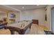 Spacious game room featuring a billiards table, TV, and sliding glass door to the outside at 14503 Crest Ct, Charlotte, NC 28278