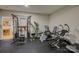 A home gym is displayed with a variety of exercise equipment and ample workout space at 14503 Crest Ct, Charlotte, NC 28278