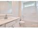 Bathroom featuring modern fixtures, single vanity, and a shower-tub combo at 1528 Croydon St, Indian Land, SC 29707