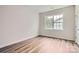 Bedroom featuring hardwood floors and a window at 1528 Croydon St, Indian Land, SC 29707