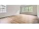 Main bedroom with hardwood floors and ample natural light at 1528 Croydon St, Indian Land, SC 29707