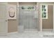 This bathroom has a glass-enclosed shower and tiled walls at 1541 Croydon St, Indian Land, SC 29707