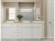 The bathroom features a double vanity with white cabinets and a framed mirror at 1541 Croydon St, Indian Land, SC 29707
