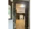 Open kitchen showcasing built-in shelving, unique stone accents, and tile flooring at 157 5Th N Ave, Taylorsville, NC 28681
