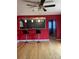 Bright living room with bamboo floors, breakfast bar, and open floor plan, complemented by stylish lighting fixtures at 157 5Th N Ave, Taylorsville, NC 28681