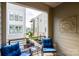 Charming balcony with comfortable seating and views of the well-maintained courtyard at 1707 Cannon View Ln, Charlotte, NC 28208