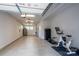 Large garage space with exercise equipment and room for storage, perfect for active residents at 1707 Cannon View Ln, Charlotte, NC 28208