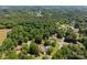 Scenic aerial shot of neighborhood, with mature trees, offering a peaceful, residential setting at 1818 Winfield Dr, Monroe, NC 28110