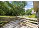 Backyard featuring a wooden deck, perfect for outdoor living at 1818 Winfield Dr, Monroe, NC 28110