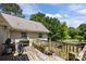 Backyard featuring a wooden deck, offering a tranquil outdoor space at 1818 Winfield Dr, Monroe, NC 28110