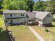 Aerial view of backyard featuring a deck and walkway, enhancing outdoor living at 1818 Winfield Dr, Monroe, NC 28110