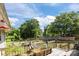 Backyard featuring a wooden deck, perfect for outdoor entertaining and relaxation at 1818 Winfield Dr, Monroe, NC 28110