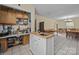Kitchen featuring white cabinets, white island and tile flooring at 1818 Winfield Dr, Monroe, NC 28110