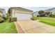 Spacious two-car garage and wide driveway offers convenience, additional parking, and compliments the exterior at 19106 Mallard Dr # 216, Fort Mill, SC 29707