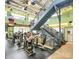 Modern community gym featuring exercise bikes, treadmills, and staircase to the second level at 19106 Mallard Dr # 216, Fort Mill, SC 29707