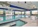 Indoor pool with large windows, providing ample natural light and scenic views at 19106 Mallard Dr # 216, Fort Mill, SC 29707