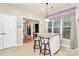 Bright kitchen features an island with barstool seating and a window overlooking the backyard at 19106 Mallard Dr # 216, Fort Mill, SC 29707