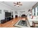 Inviting living room with hardwood floors seamlessly connects to the dining area for easy entertaining at 19106 Mallard Dr # 216, Fort Mill, SC 29707