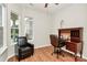 Sunlit office with wood floors, two windows, and a stylish desk creates a productive workspace at 19106 Mallard Dr # 216, Fort Mill, SC 29707