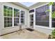 Covered patio with white trim and a small table and chairs at 19106 Mallard Dr # 216, Fort Mill, SC 29707