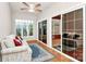 Relaxing sunroom with a ceiling fan, plenty of windows, and access to the back patio at 19106 Mallard Dr # 216, Fort Mill, SC 29707