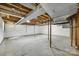 Unfinished basement showing support columns and utilities at 2001 Lakeview Dr, Pineville, NC 28134