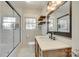 Modern bathroom with glass shower, vessel sink, and stylish vanity at 2001 Lakeview Dr, Pineville, NC 28134