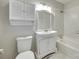 This bathroom has a vanity with storage, tub shower combo and tiled walls at 2001 Lakeview Dr, Pineville, NC 28134