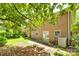 A charming brick home exterior featuring access to the backyard at 2001 Lakeview Dr, Pineville, NC 28134