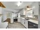 Modern kitchen features white cabinets, stainless steel appliances and stylish backsplash at 2001 Lakeview Dr, Pineville, NC 28134