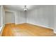 Inviting room featuring hardwood floors and elegant lighting at 2001 Lakeview Dr, Pineville, NC 28134