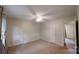 Bedroom with ceiling fan, carpeting and natural light at 2026 Willow Ridge St, Conover, NC 28613