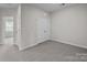 Comfortable bedroom featuring plush carpeting, neutral walls and double door closet at 206 Overstone Ct, Fort Mill, SC 29715