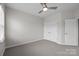 Bedroom featuring carpet, a ceiling fan, and two closets at 206 Overstone Ct, Fort Mill, SC 29715