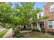 Townhome community featuring well-maintained landscaping and sidewalks, creating a welcoming and picturesque neighborhood setting at 206 Overstone Ct, Fort Mill, SC 29715
