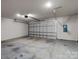 Spacious two-car garage with a large door and ample room for storage at 206 Overstone Ct, Fort Mill, SC 29715