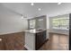 Kitchen featuring granite countertops and hardwood floors with stainless steel appliances at 206 Overstone Ct, Fort Mill, SC 29715