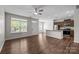 An open concept kitchen and living room with hardwood floors and natural light at 206 Overstone Ct, Fort Mill, SC 29715