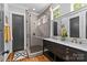 Modern bathroom showcasing a walk-in shower, double vanity, and stylish fixtures, creating a luxurious feel at 2615 Chesterfield Ave, Charlotte, NC 28205