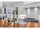 Close-up of a kitchen island featuring a wooden countertop, stainless steel appliances, and ample natural light at 2615 Chesterfield Ave, Charlotte, NC 28205
