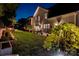 Inviting backyard with a patio, outdoor seating, and mature landscaping offers a peaceful outdoor living space at 2630 Mary Butler Way, Charlotte, NC 28226