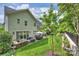 Well-maintained backyard with a patio, garden, and ample green space provides a relaxing retreat at 2630 Mary Butler Way, Charlotte, NC 28226